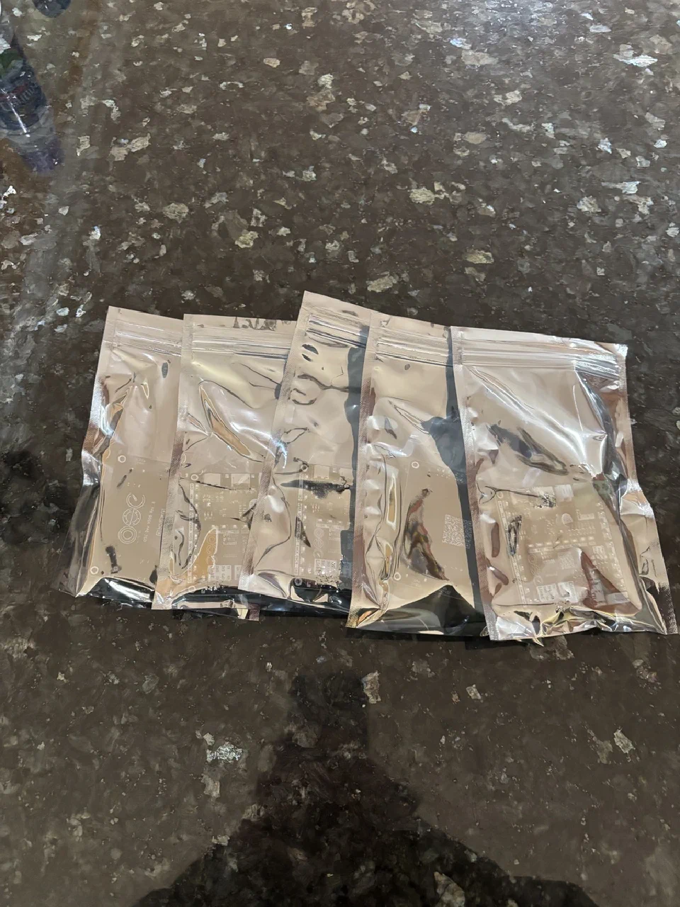 Five Rev B boards arriving in ESD bags